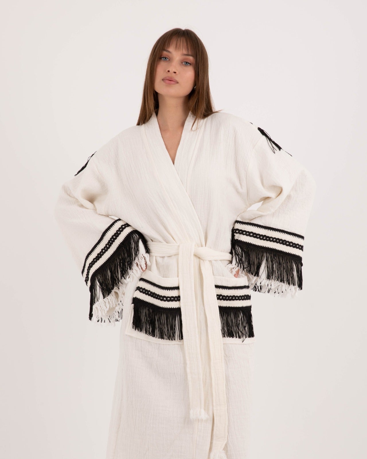 Black tassel robe by Just Jas featuring long sleeves, a relaxed fit, and elegant tassel details for a stylish, comfortable look.