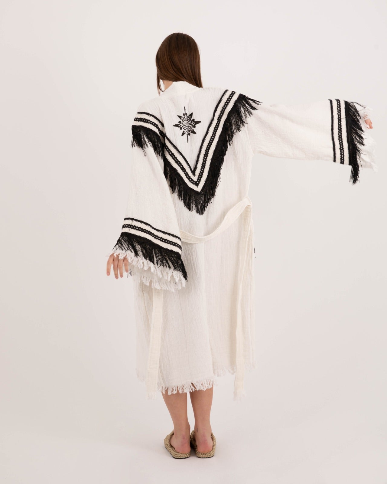 Black tassel robe by Just Jas featuring a chic, flowing design with tassel accents and a relaxed fit.