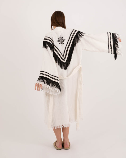 Black tassel robe by Just Jas featuring a chic, flowing design with tassel accents and a relaxed fit.